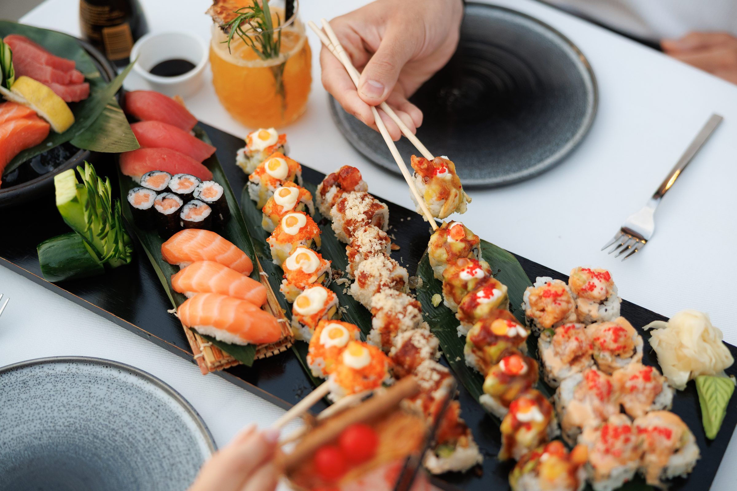 A platter of sushi rolls and nigiri